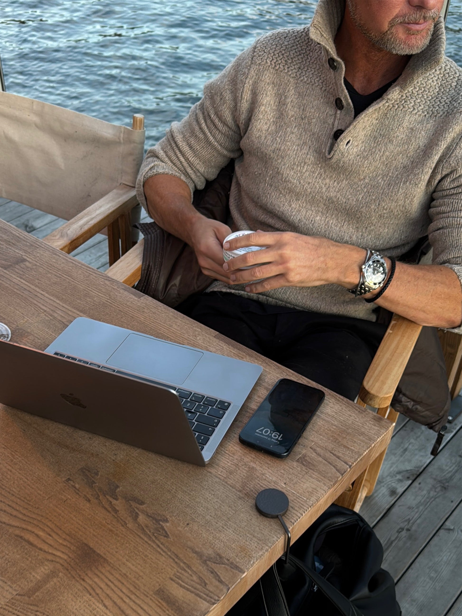 Compact bag hook that keeps your work bag and jacket clean and within reach.