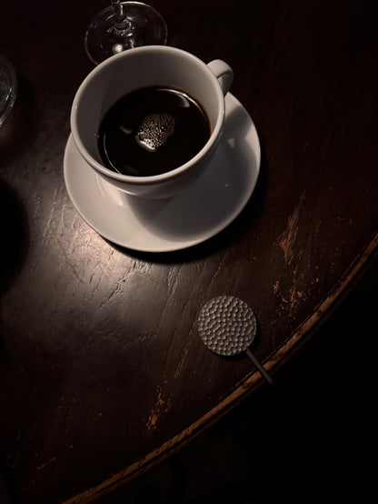 Elegant handbag hook designed to keep your bag off the floor at restaurants.